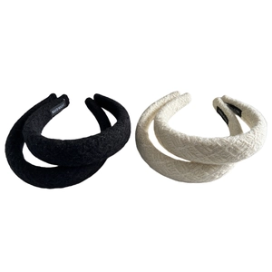 Elegant tweed headband set with shimmering sequins in classic black and creamy white colors