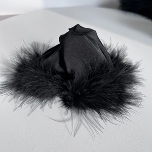 Elegant large black hair claw clip with plush feathers and silk satin finish for women