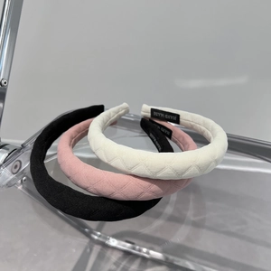 Three-piece set of thick quilted plaid sponge headbands in black, pink, and beige