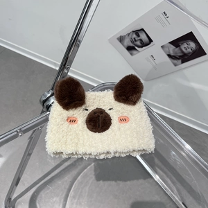 Close-up of cute plush bear ears headband in soft cream fleece for daily face washing
