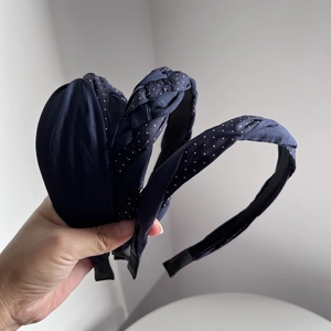 Three-piece navy blue polka dot headband set featuring braided and knotted fabric designs