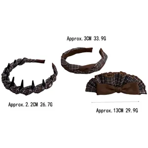 Three-piece set of brown plaid fabric headbands with anti-slip teeth and bow accents