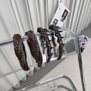 Brown plaid fabric headband and hair claw set in retro preppy style with bow detail