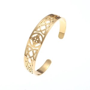 Minimalist golden stainless steel open C-shape cuff bracelet with hollow Celtic knot design