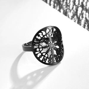 Detail of matte black Viking Vegvisir compass ring with hollow adjustable snowflake band