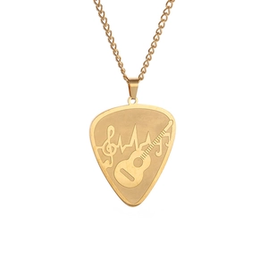 Gold stainless steel necklace with heart-shaped guitar pick pendant and musical symbols