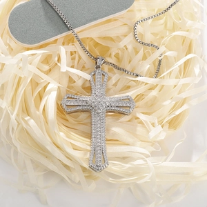 Sparkling cross pendant necklace with micro-pave zircons and heart center detail