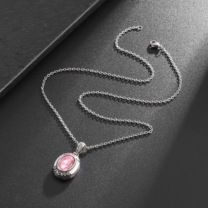 Collier médaillon ovale filigrané vintage avec pierre rose en cuivre plaqué argent