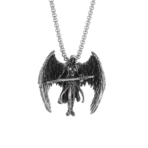 Vintage silver Archangel Michael pendant necklace with detailed wings and sword on white background