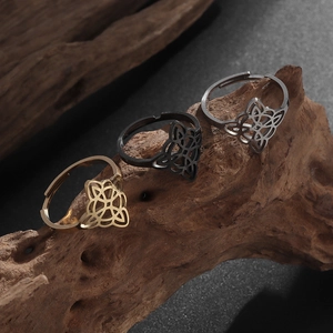 Three-piece Celtic witch knot ring set in gold, silver and black finish with open band