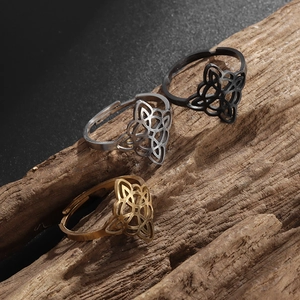 Three-piece stainless steel Celtic witch knot rings in gold, silver, and black colors