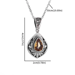 Vintage water drop pendant necklace with amber zircon and engraved floral patterns