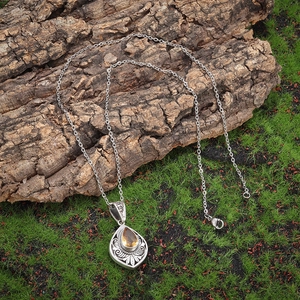 Vintage silver alloy necklace with teardrop yellow zircon and intricate floral engraving