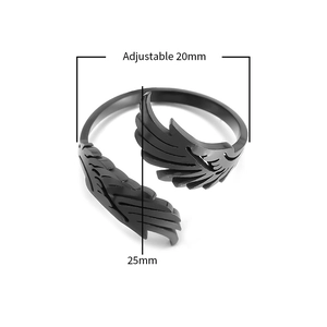 Adjustable black stainless steel angel wing ring featuring detailed feather textures