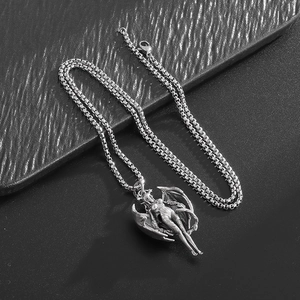 Gothic silver winged succubus pendant necklace on black leather background