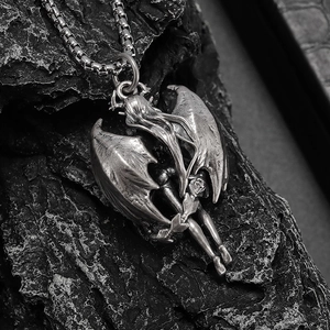 Gothic silver devil wings pendant with cthulhu design on a solid square box chain