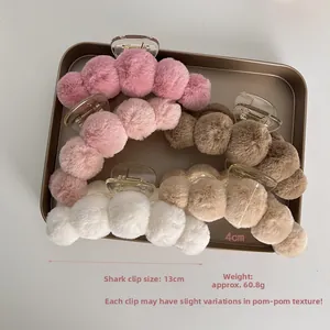 Detailed view of 13cm plush claw clips in five colors showing dimensions and soft texture