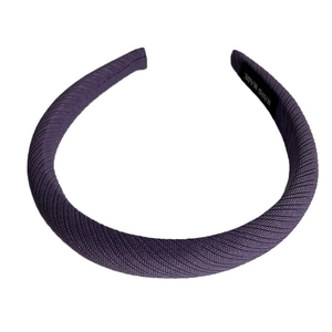 Solid deep purple ribbed fabric headband with high top sponge and handmade label