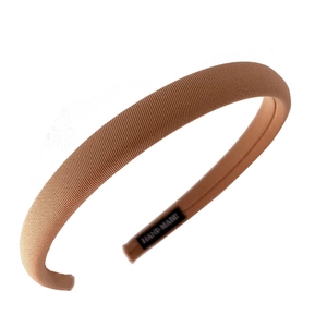 Brown padded sponge headband with ribbed corduroy texture shown from a 45-degree angle view