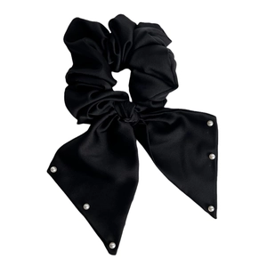 Elegant black satin bow scrunchie with white pearl accents for vintage hair styling