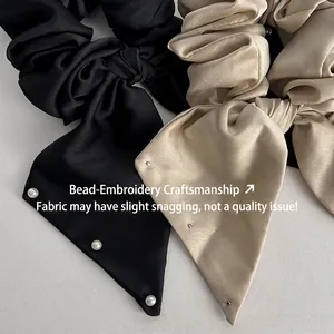 Elegant satin bow hair scrunchies with white pearls in black and champagne gold