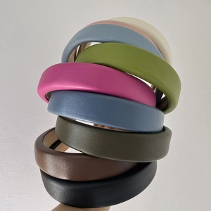 Elegant solid color thick PU leather headbands in multiple vibrant colors for women