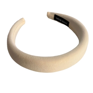 Puffy sponge headband in cream beige with thick velvet texture and handmade label