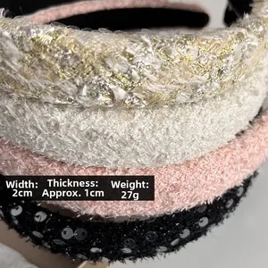 Close-up of sparkling sequin fabric headbands with dimensions 2cm wide and 1cm thick