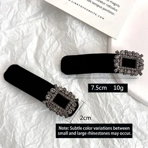 Pair of vintage black velvet hair clips with sparkling crystal rhinestones for women