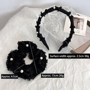 Ensemble d'accessoires à cheveux noirs avec serre-tête et chouchou à nœud et perles
