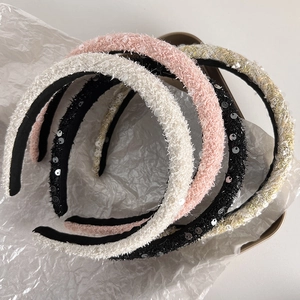 Elegant sequined sponge headbands in pink, cream, black and gold knit fabric