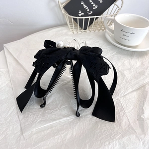 Elegant black fabric bow banana clip with lace trim and white pearls for ponytail styling