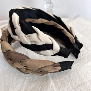 Handmade chunky braided wide headband for women featuring textured knot design in neutral tones