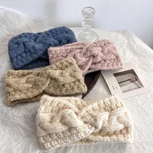 Fasce per capelli invernali in maglia a treccia nei colori pastello alla moda