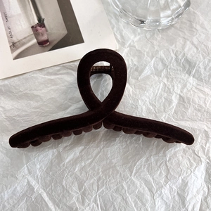 Minimalist coffee brown flocked hair claw clip with matte velvet texture for women