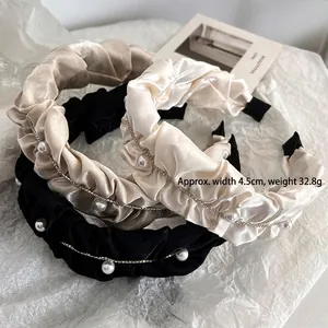 Elegant fabric headband set with pearls and rhinestones in champagne and black colors