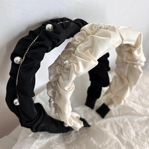 Elegant satin pleated headband with pearls and rhinestones in black and beige colors