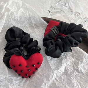 Handmade black satin scrunchies featuring red velvet hearts with punk black cone studs
