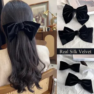 Elegant black silk velvet bow hair clip set in various sizes for stylish women