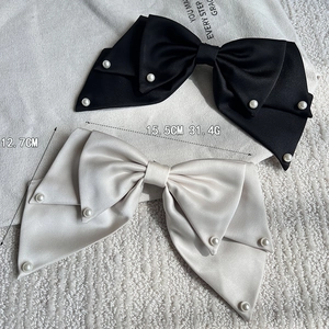 Elegant satin bow hair clips with white pearls in black and cream, 15.5cm size
