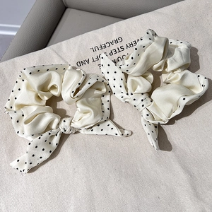 Polka dot cream satin hair scrunchies with long ribbons and elegant bow design