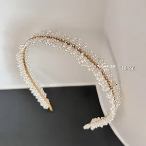 Detail of elegant headband with small white pearls and crystals, 2.0cm wide, weighing 18.6g