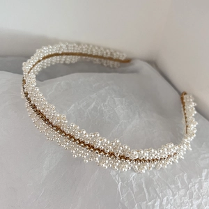 Elegant gold metal headband with multi-layer white pearls and sparkling rhinestones
