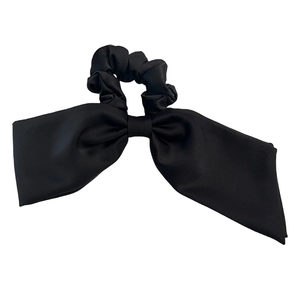 Elegant large black satin bow hair scrunchie made of premium silk-like fabric with elastic band