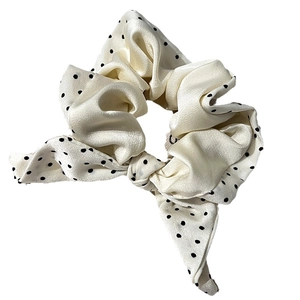 Satin polka dot scrunchie with bow tie hair tie for women in white and black