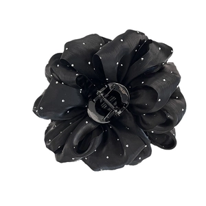 Pince à cheveux fleurie en tissu noir de 11cm avec paillettes argentées et prise sûre