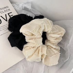 French vintage oversized scrunchies in black and beige with frayed edge textured fabric