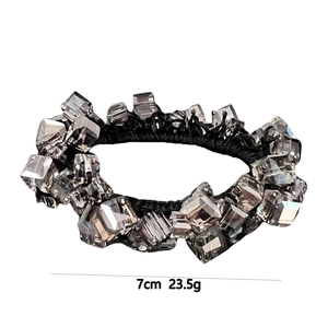 Elastic ponytail holder with faceted grey crystals, 7cm diameter and 23.5g weight