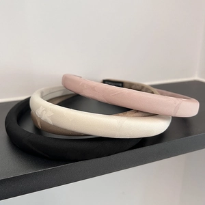 Chic padded jacquard headbands in pink, beige, camel, and black silk-like fabric