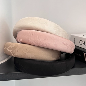Vintage jacquard padded headbands in beige, pink, khaki, and black colors